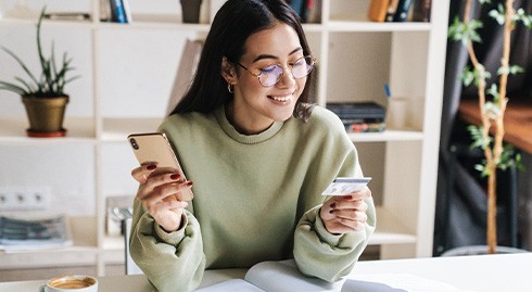 Woman using a credit card