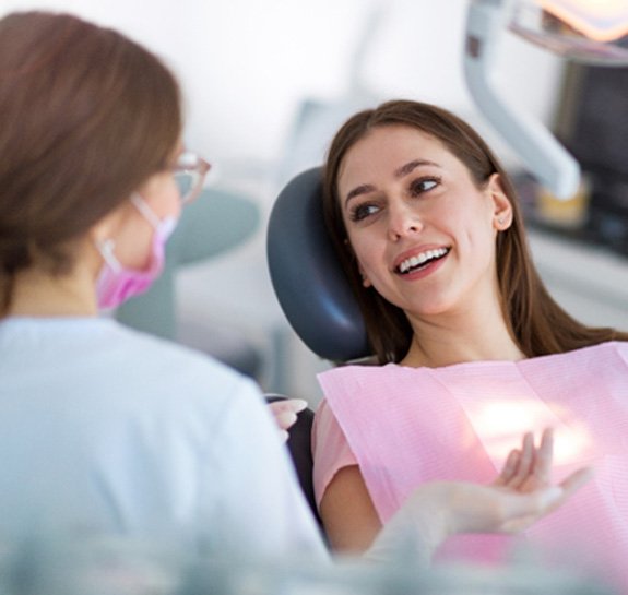 dentist speaking with a patient