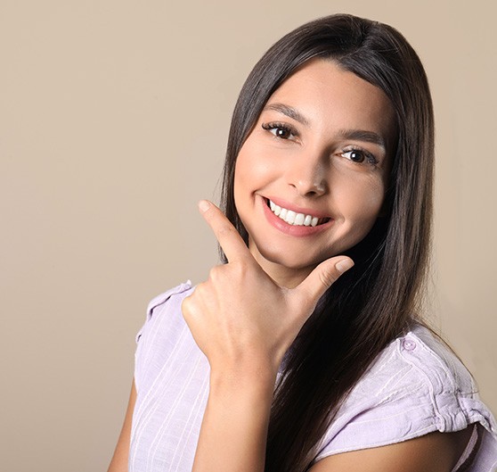 a patient showing off her smile